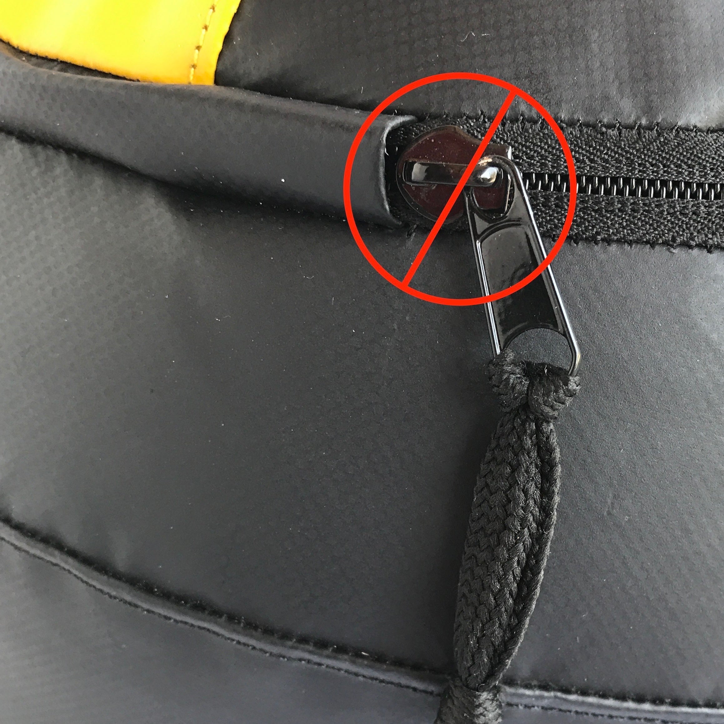 A Variaball® zipped shut but with the zipper pull tab NOT stored away properly